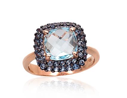 Ring aus Rotgold mit Zirkonia und himmelblauen Topasen