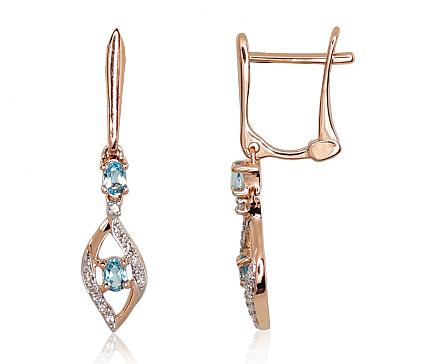 Ohrringe aus Rotgold mit Diamanten und blauen Topasen